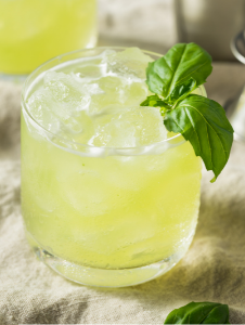 A gin basil smash in a glass.