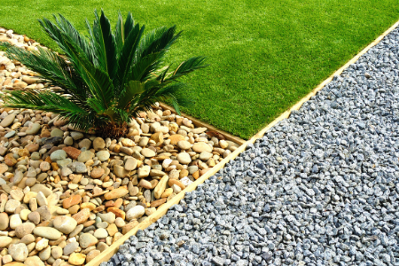 grass, rock, and gravel, representing the how landscaping can increase home value