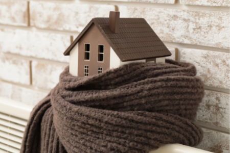 a home with a scarf, showing how it's important to save energy in winter