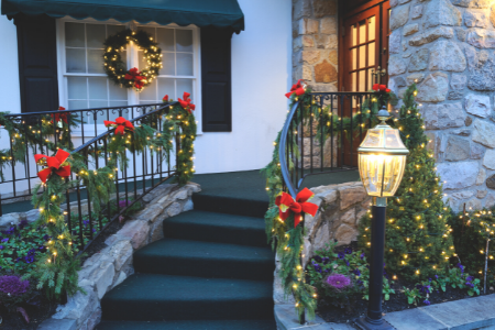 Lights along an entryway, a popular way to decorate your home's exterior for Christmas.