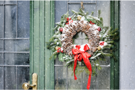 a wreath on a door, one of the popular ways to decorate your home's exterior for Christmas