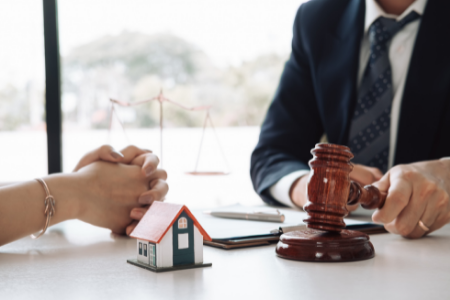 a man with a gavel symbolizing a final decision on bankruptcy.