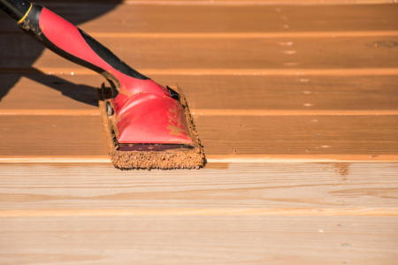 Clean and waterproof your deck to prepare your home for summer weather.