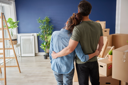 A couple taking a moment to celebrate for finding the right home.