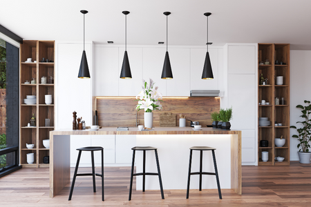 A modern kitchen utilizing natural wood materials for the counter, backsplash, and shelving- a kitchen trend in 2023.