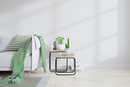 Basic side tables near a couch, representing a low maintenance home.