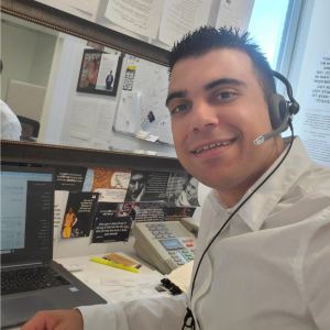 Gary Cirillo making prospecting phone calls from his desk.