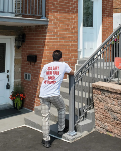 Cirillo door-knocking in a neighborhood.