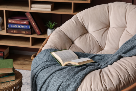 A papasan chair for reading.