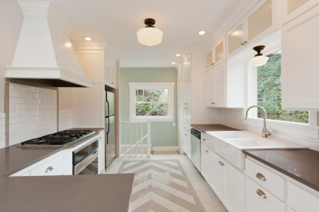 A kitchen in a new home that could benefit from some upgrades.