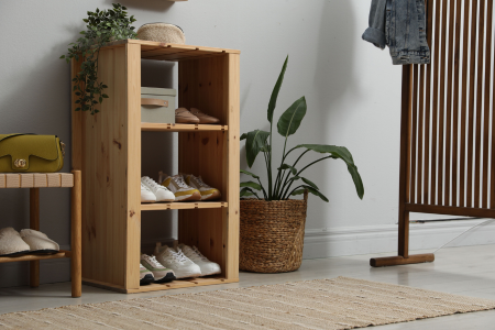 Focusing on a zone such as the entryway is a low stress way to practice the one-touch rule.