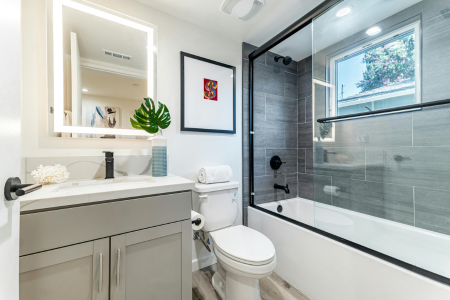 A clear shower enclosure makes a small bathroom feel larger.